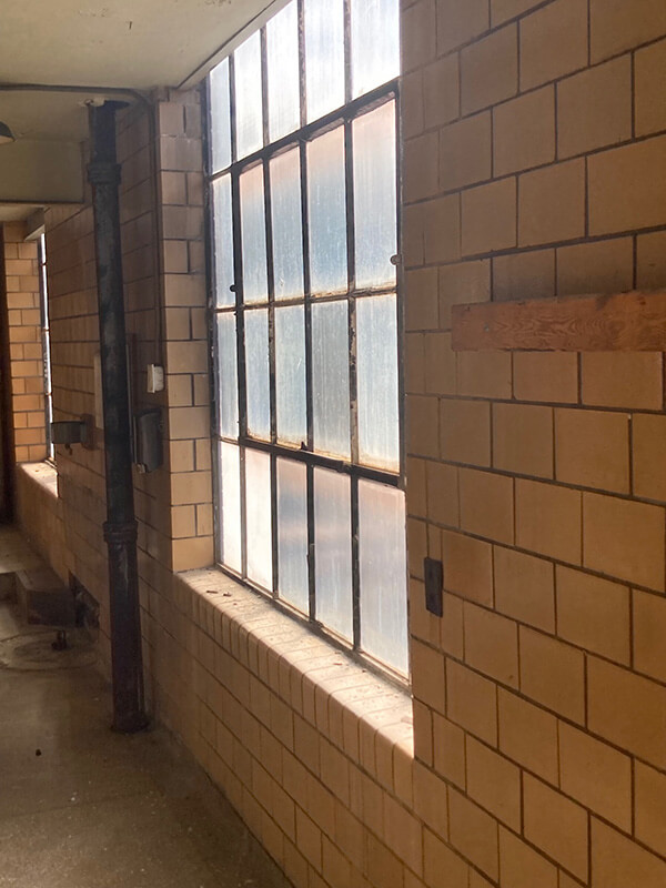 closeup of old window inside grand haven building