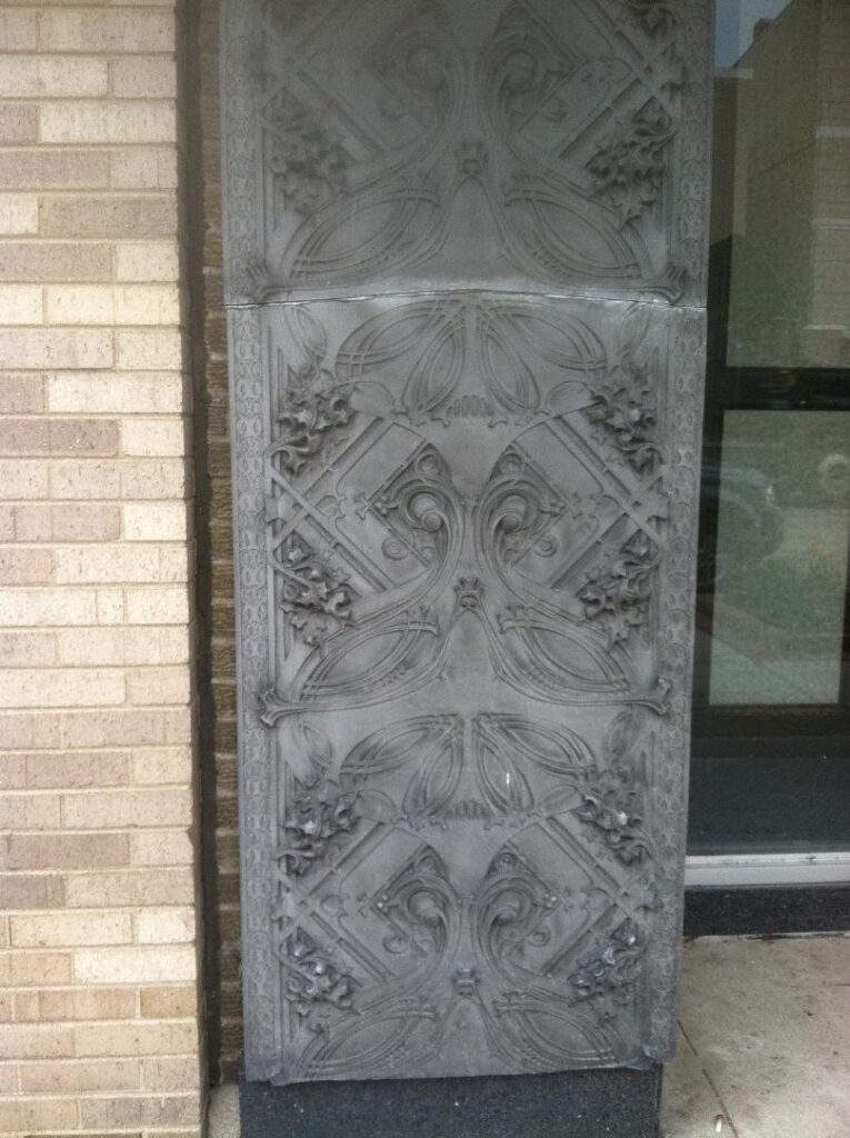 Cast iron ornaments from the Sullivan Center that were installed on the facade of the Carson Building, Ottawa, IL.